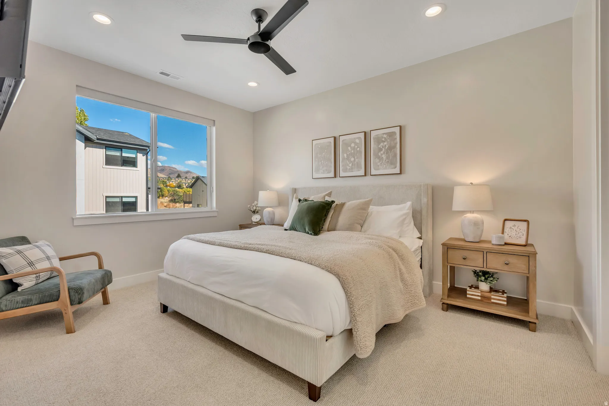 Bedroom featuring recessed lighting, a ceiling fan, and carpet