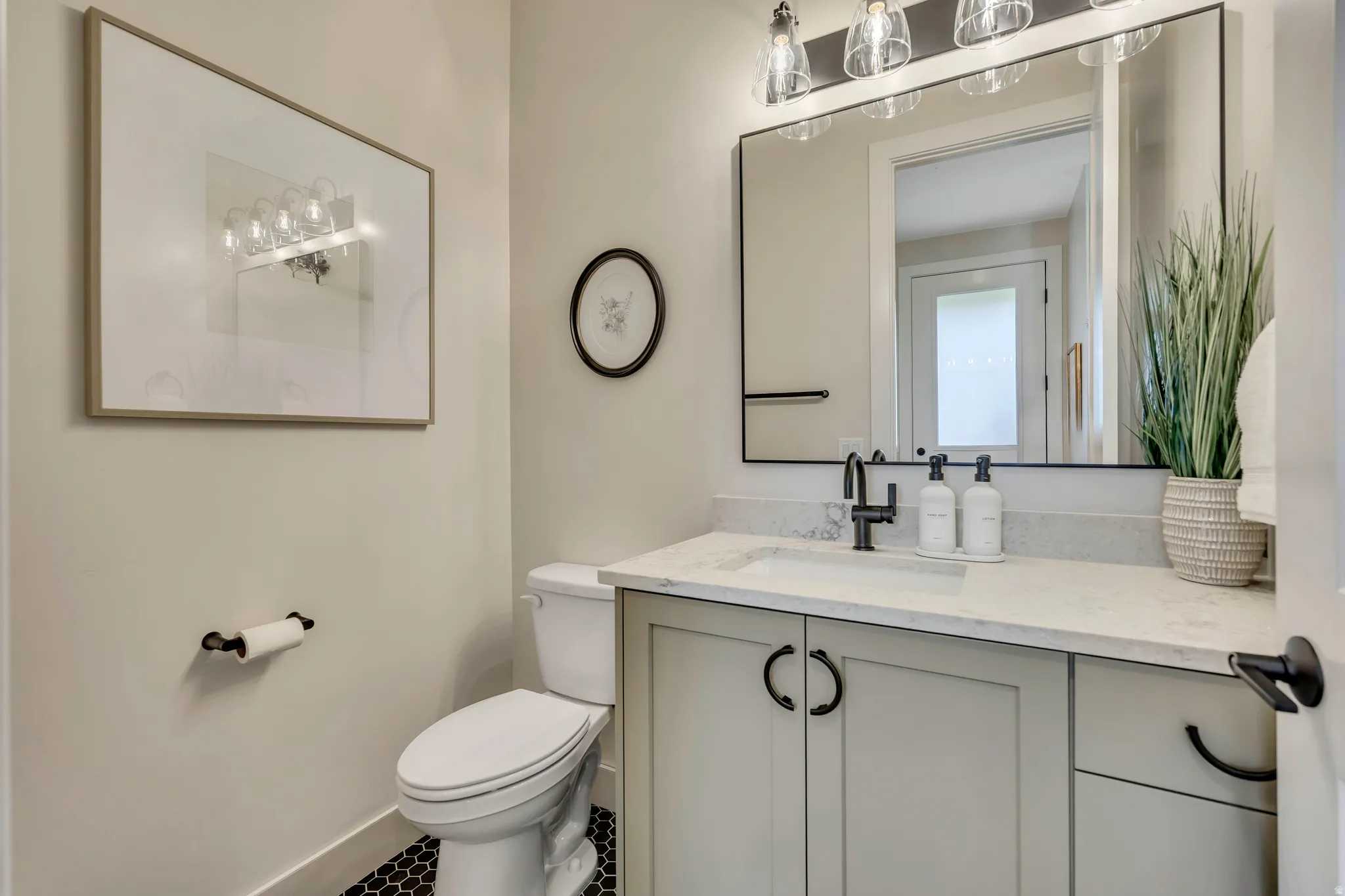 Bathroom with vanity and toilet