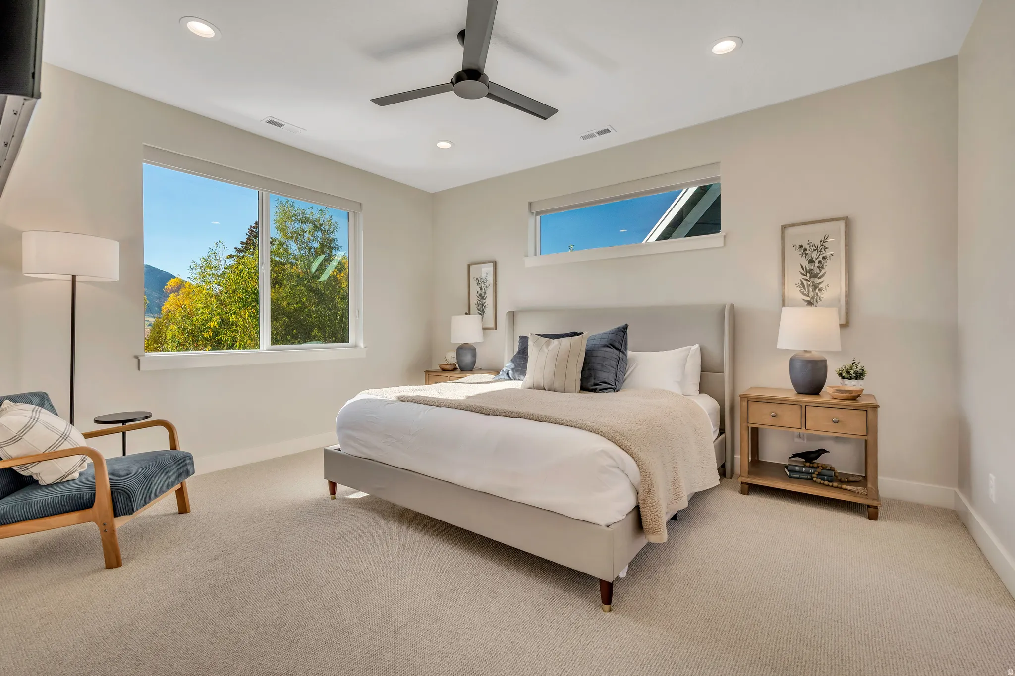 Carpeted bedroom featuring recessed lighting and ceiling fan