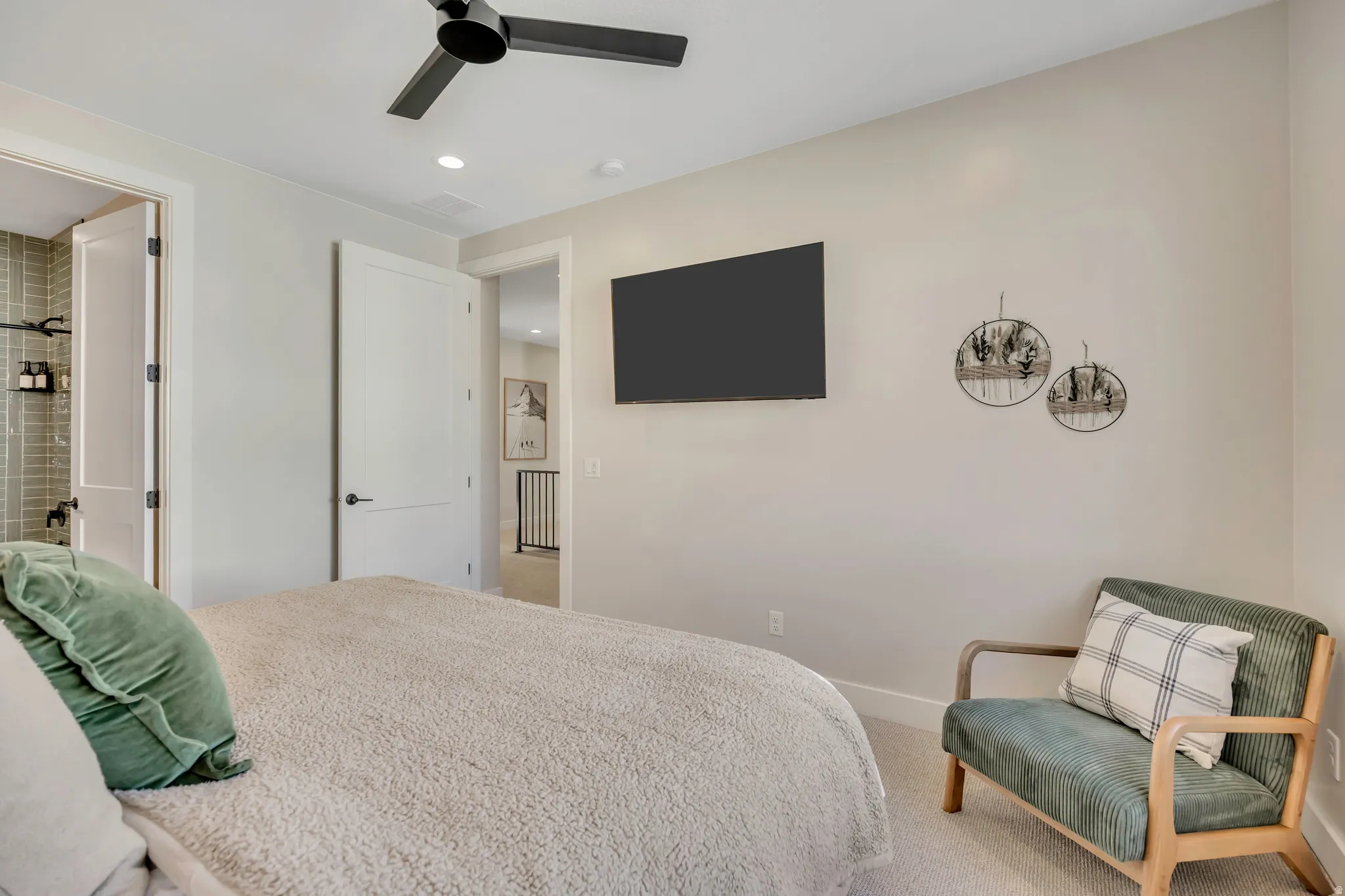 Bedroom with carpet, ensuite bath, a ceiling fan, and recessed lighting