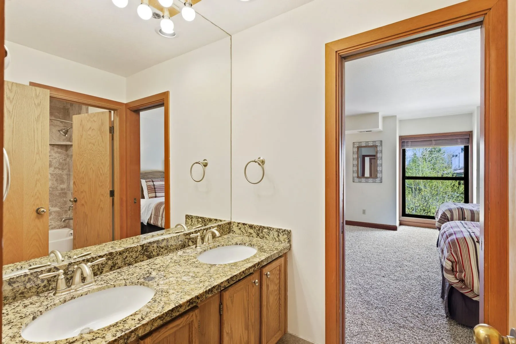 Dual vanity with an expansive countertop and integrated sinks