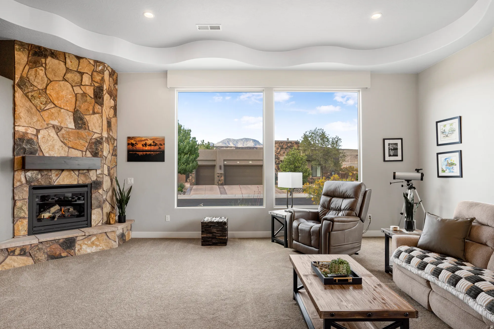 Stone-faced fireplace with a wood mantel