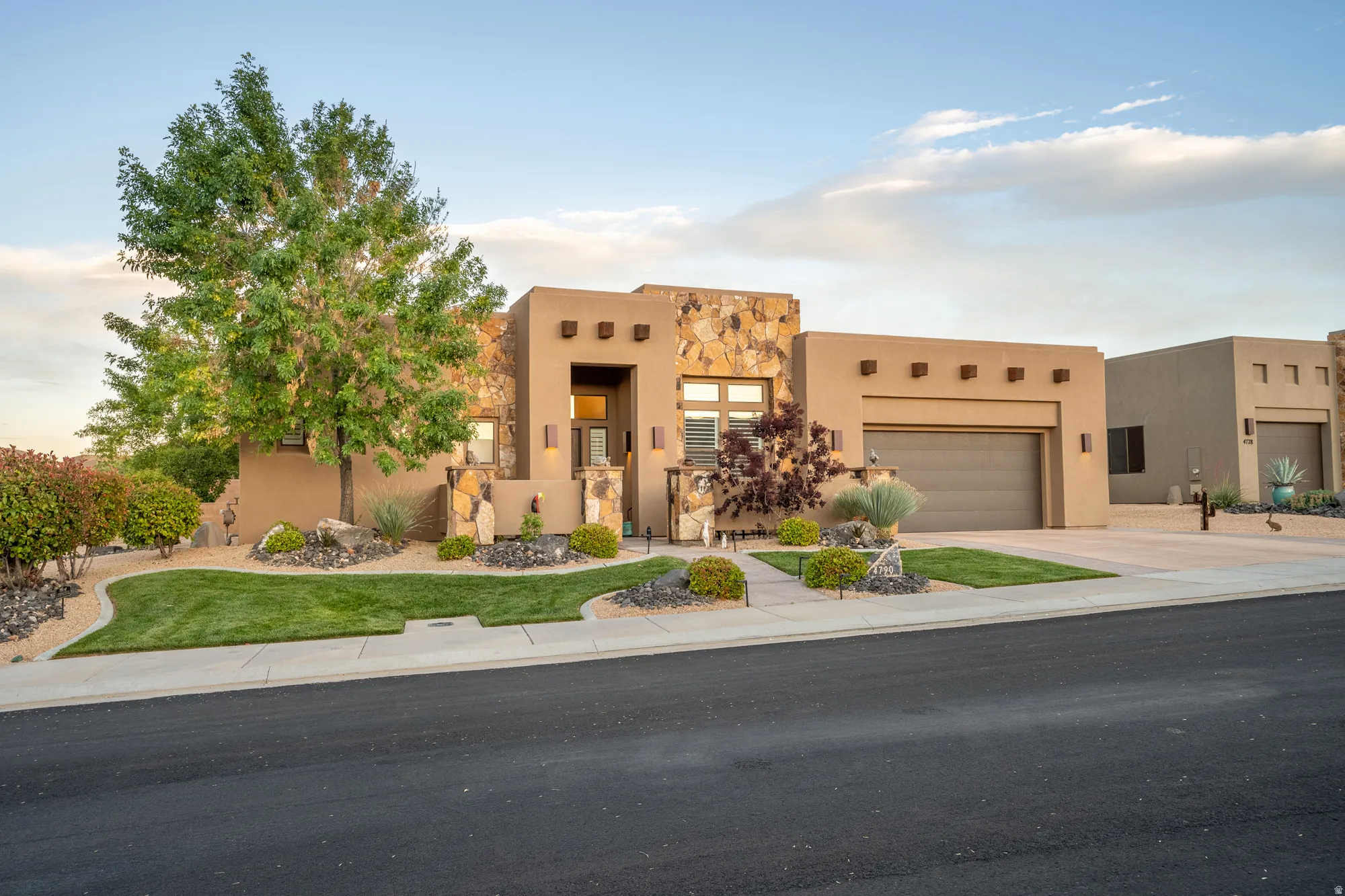 Southwestern-style stucco exterior with stone accents