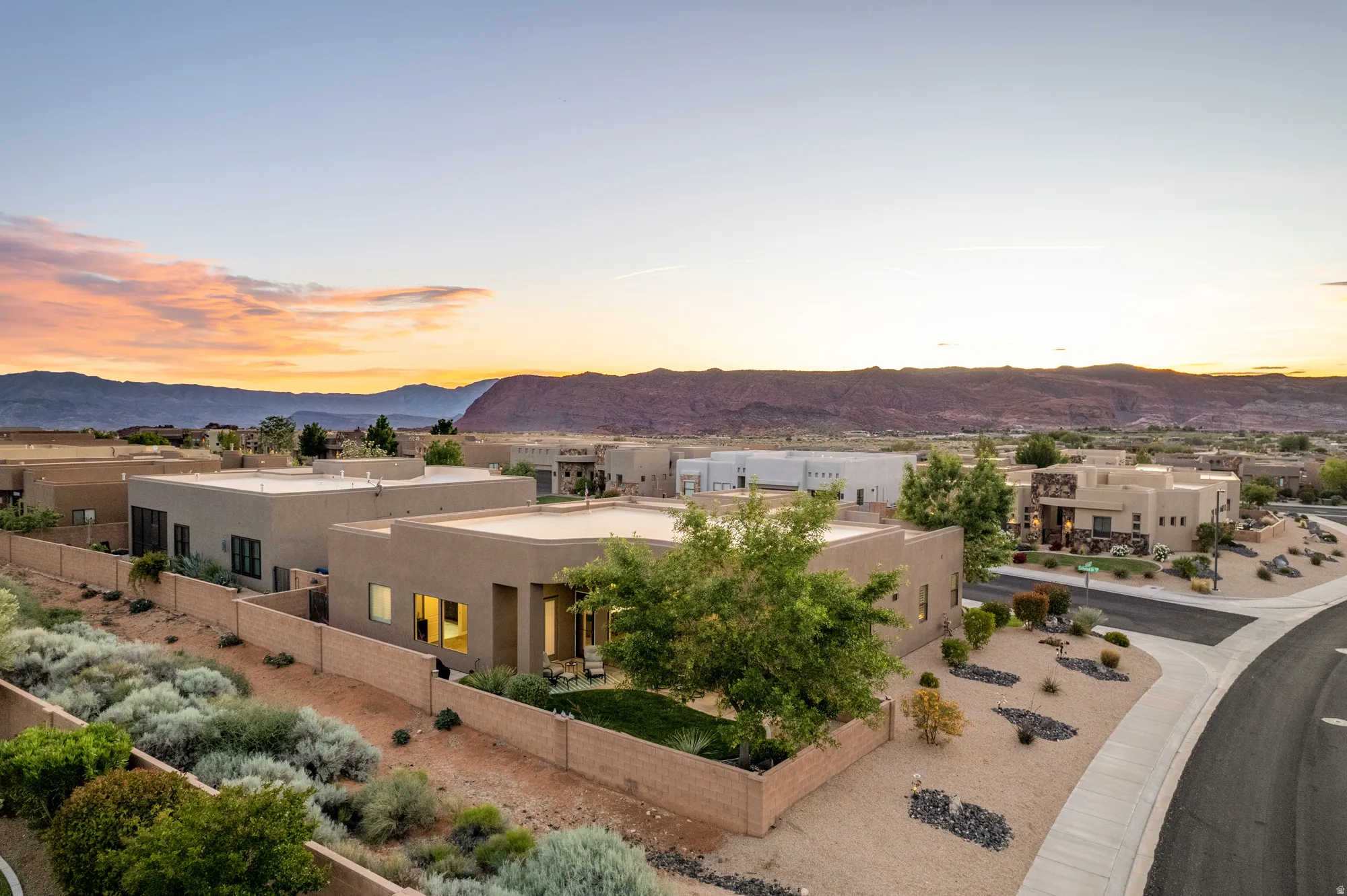 Contemporary stucco exterior with a flat roofline