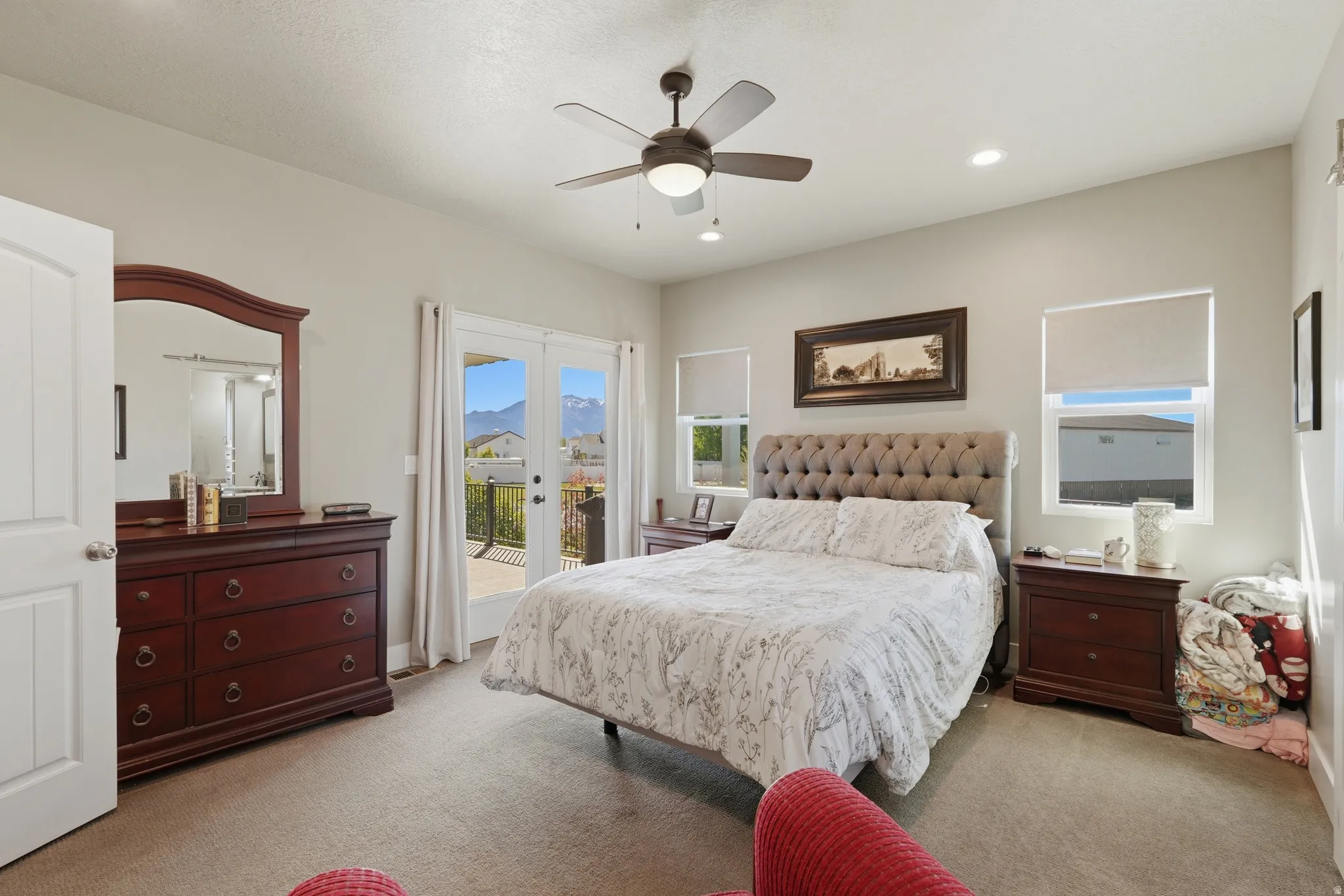 Bedroom featuring plush carpeting, a ceiling fan with integrated lighting, recessed lighting, and white trim
