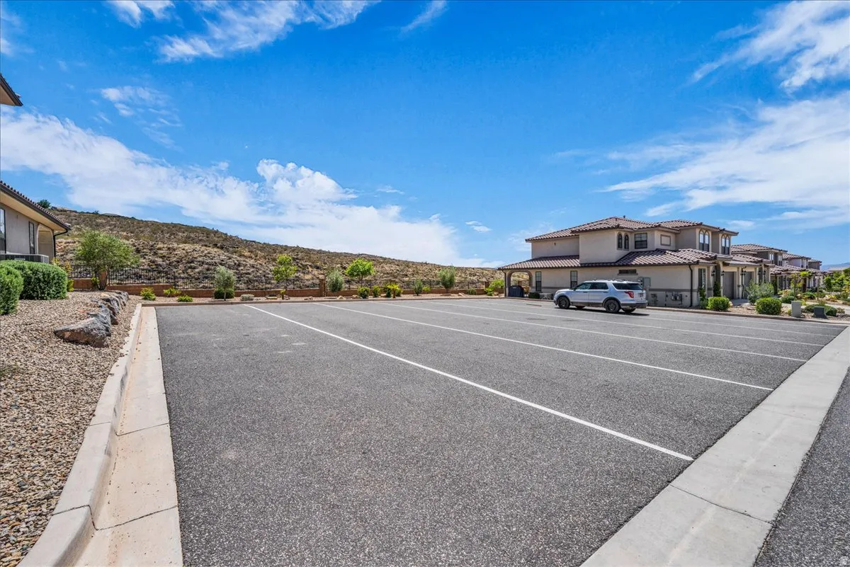 Spacious paved parking area with marked stalls