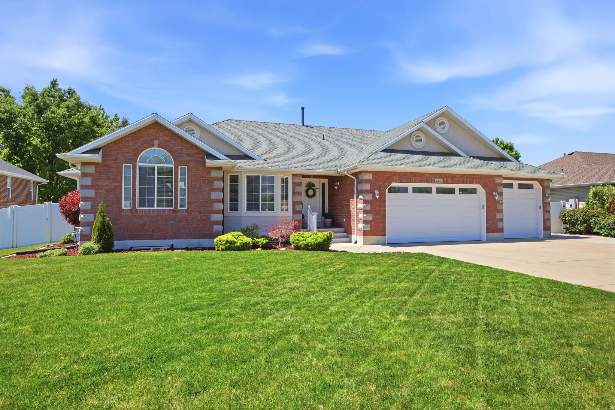 Red brick exterior with white trim accents