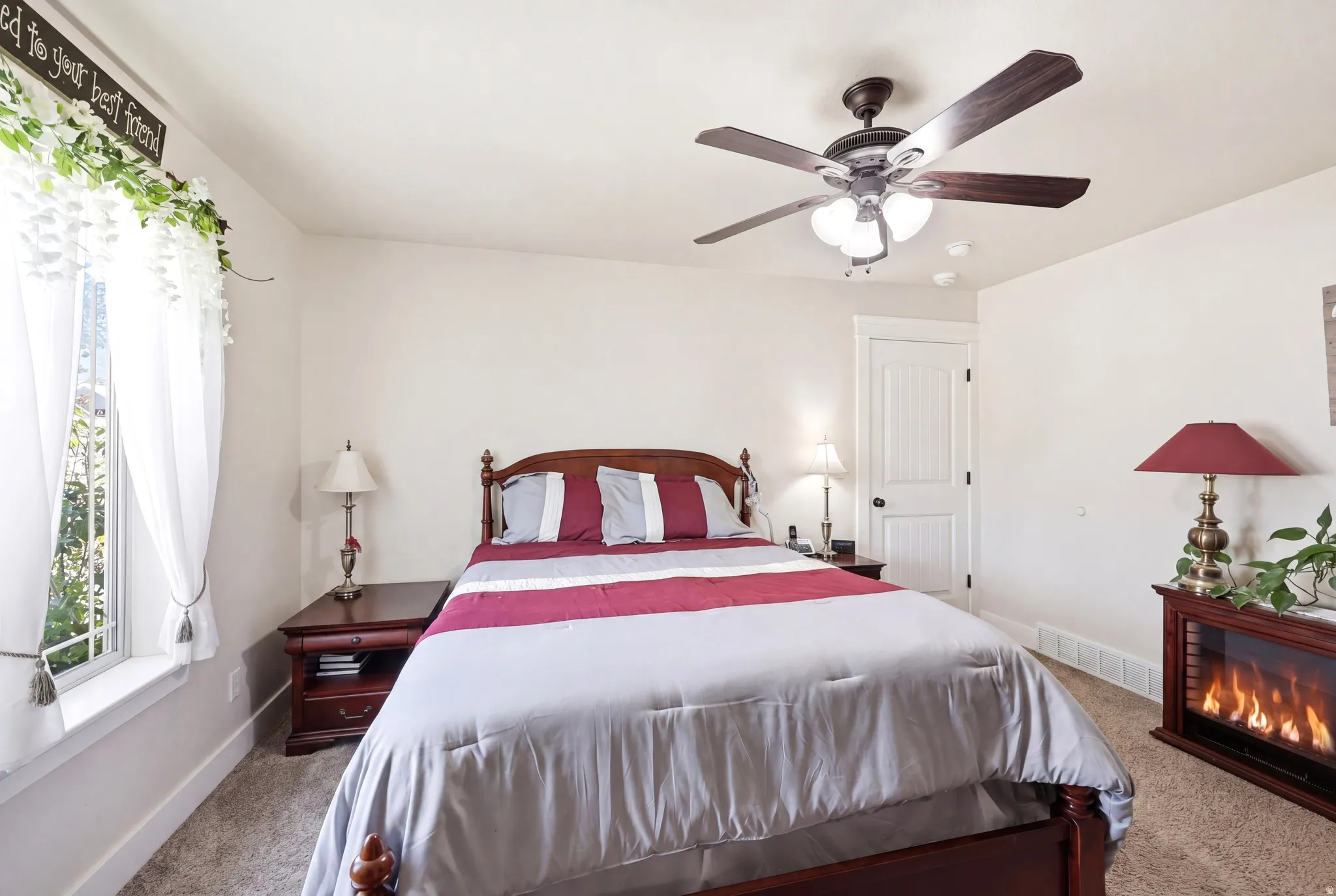 Neutral wall tones complement the durable carpet flooring
