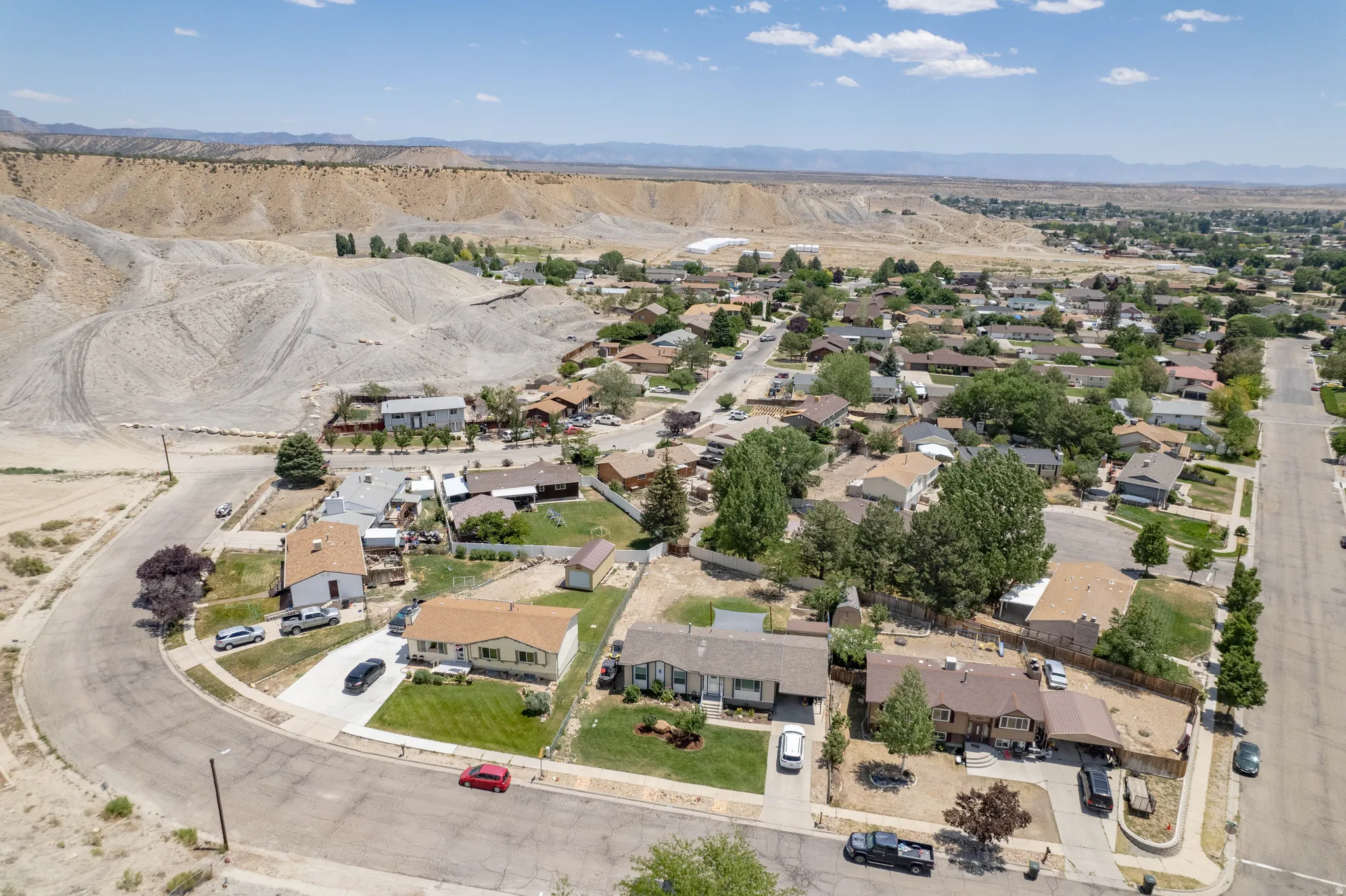 Enjoy a bird’s-eye view of the neighborhood, showcasing the community setting and close proximity to local conveniences.