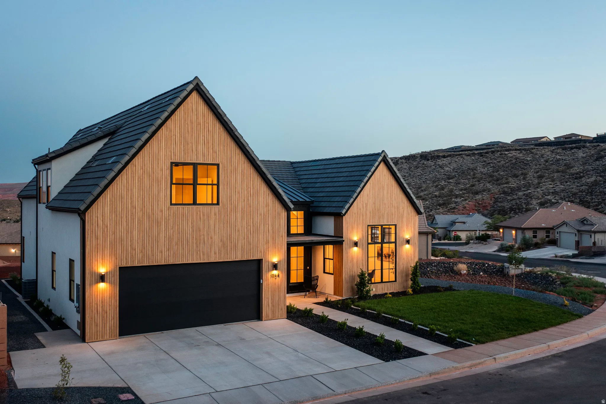 Modern architectural design featuring vertical wood siding and light-toned stucco