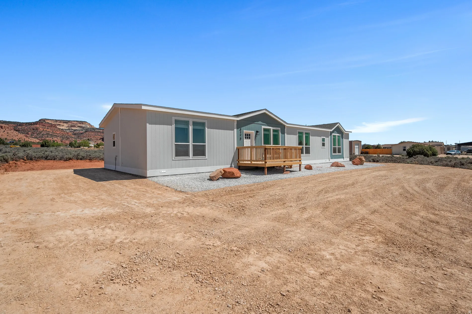 Light gray exterior with contrasting dark trim accents