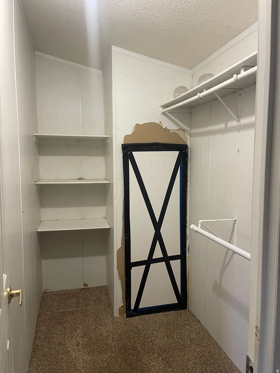 Walk-in closet primary bedroom
