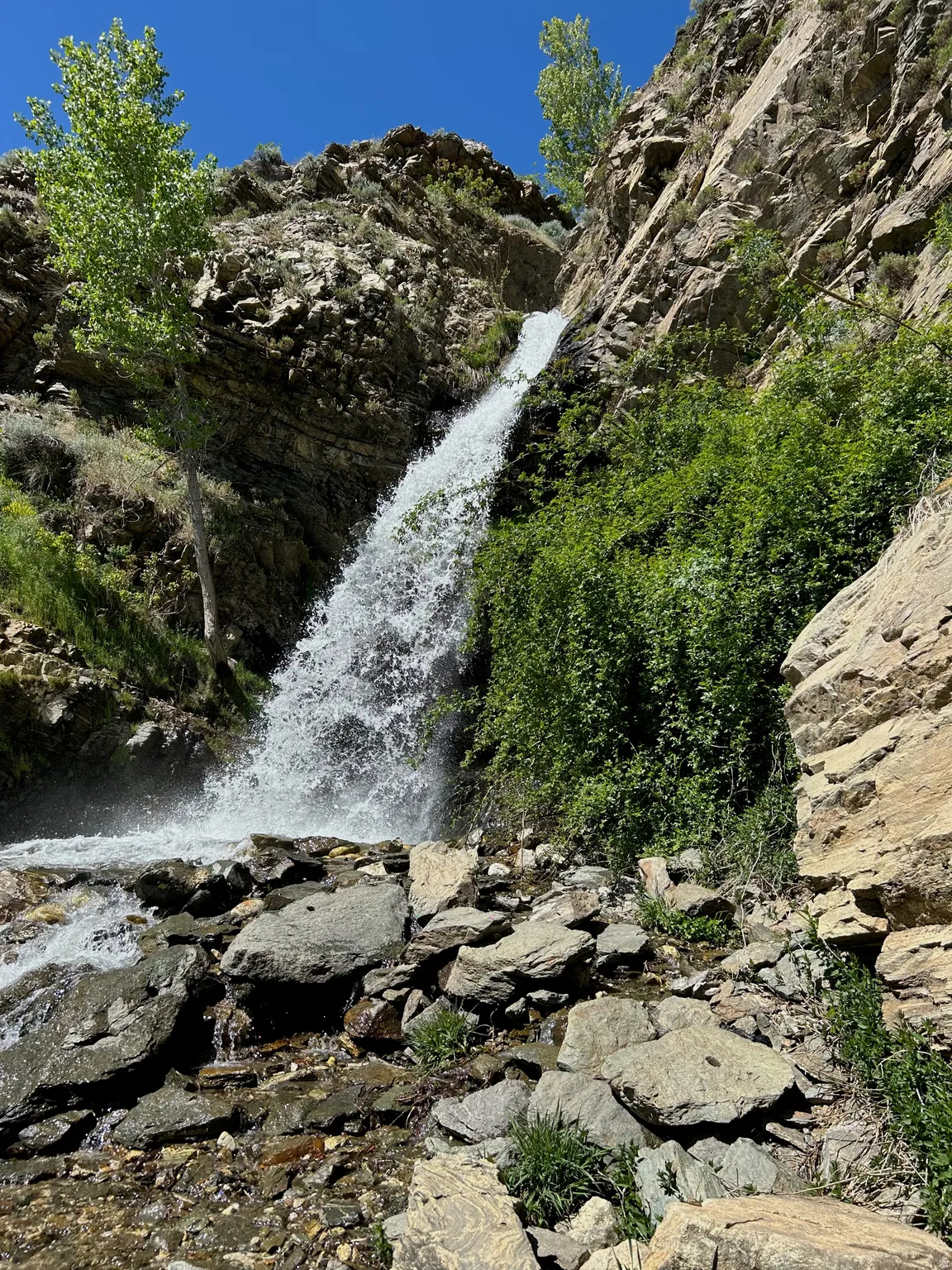 Natural waterfall cascading over rock formations