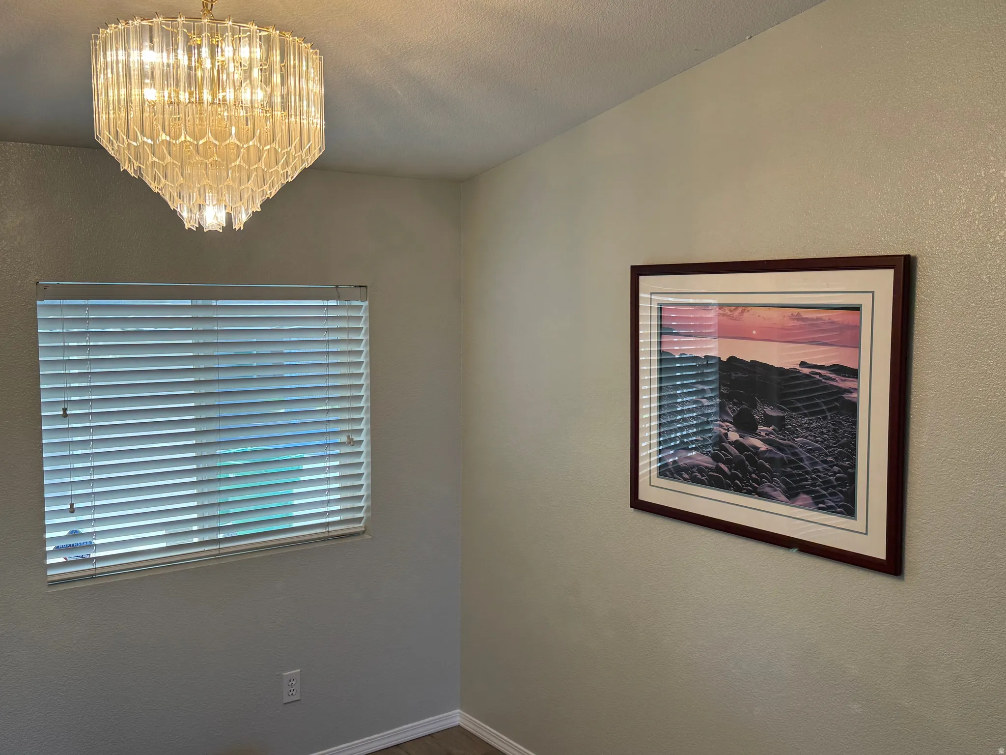 Decorative ceiling light fixture illuminates interior space