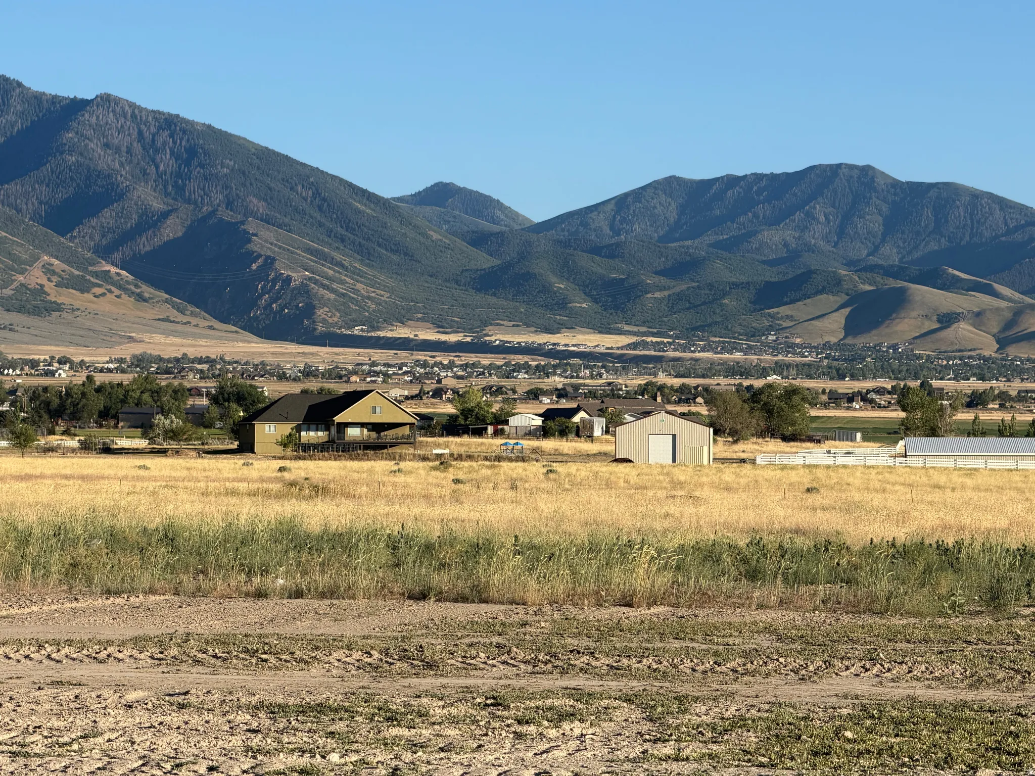 Mountain backdrop with a distant residential area