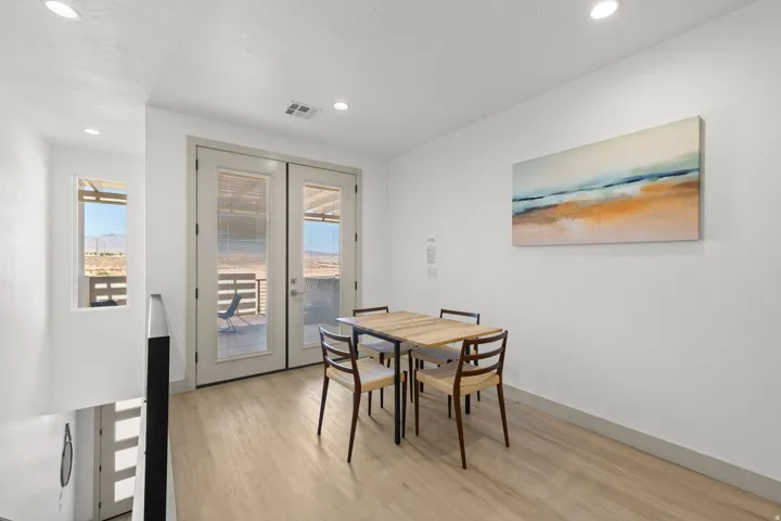 Interior space featuring light wood-finish flooring and recessed lighting