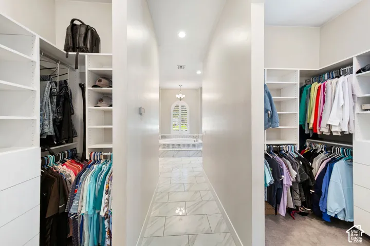 Custom closet systems with extensive shelving and hanging space