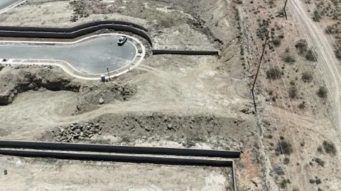 Developing land parcel featuring a cul-de-sac and graded building sites