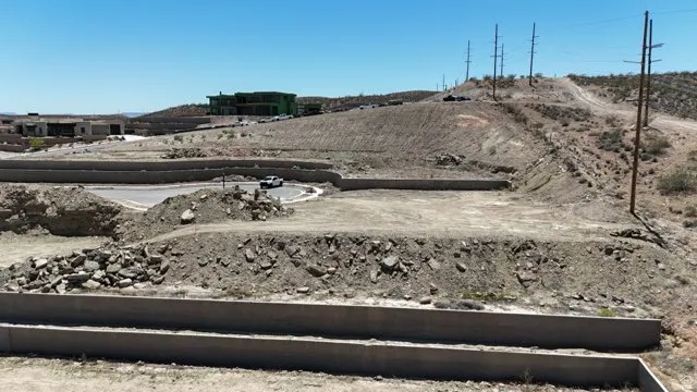 Terraced building lots with concrete retaining walls