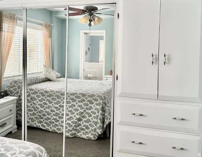 Master bedroom with built in storage.mirrored doors,  custom master bath with garden tub.