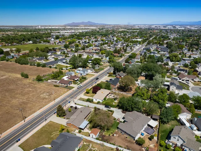 Aerial perspective showcasing a residential area with varied housing styles and mature landscaping
