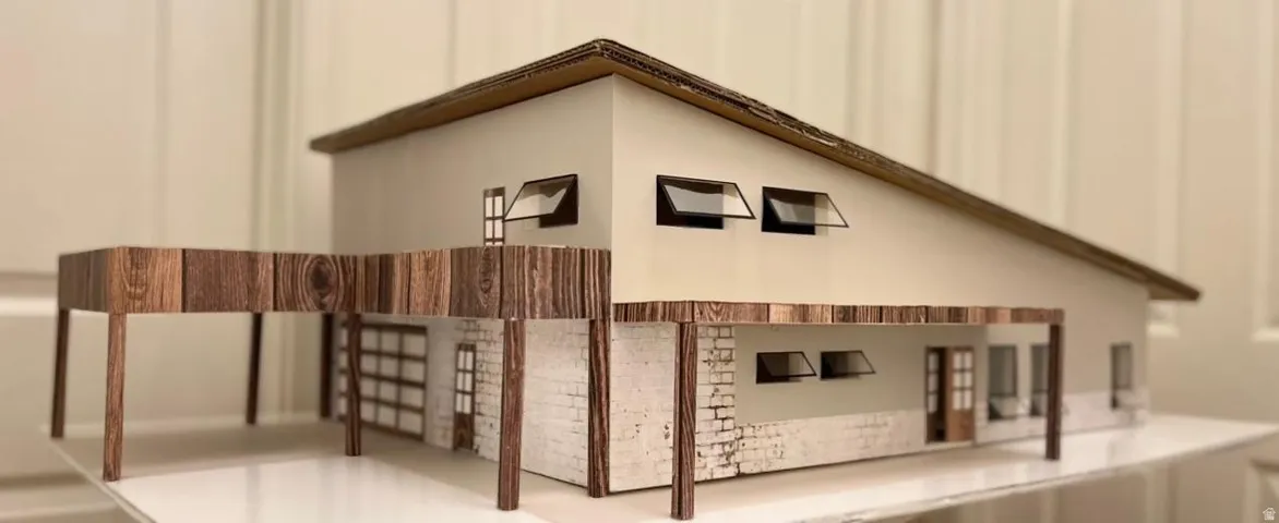 Contemporary architectural model featuring an open carport, wood-finish columns, a pitched roofline, and modern transom windows