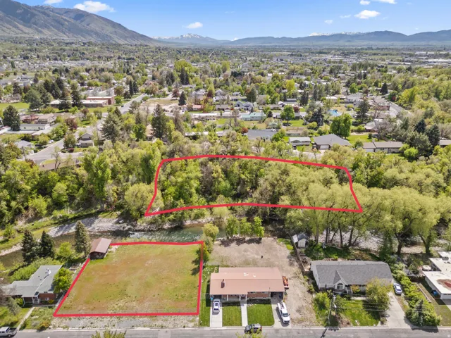 Expansive aerial perspective showcasing multiple parcels of land
