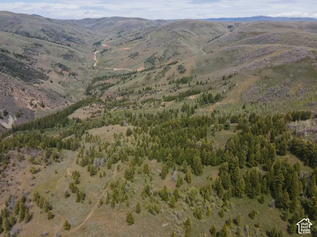 Expansive mountain landscape featuring varied terrain