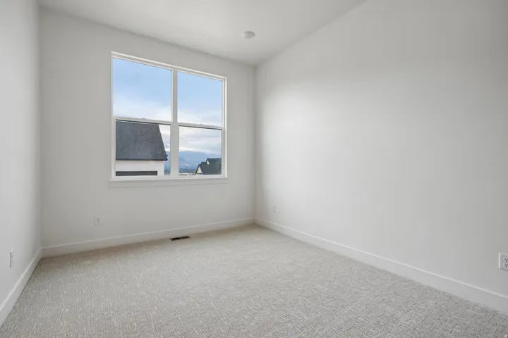 Neutral tone walls with white trim