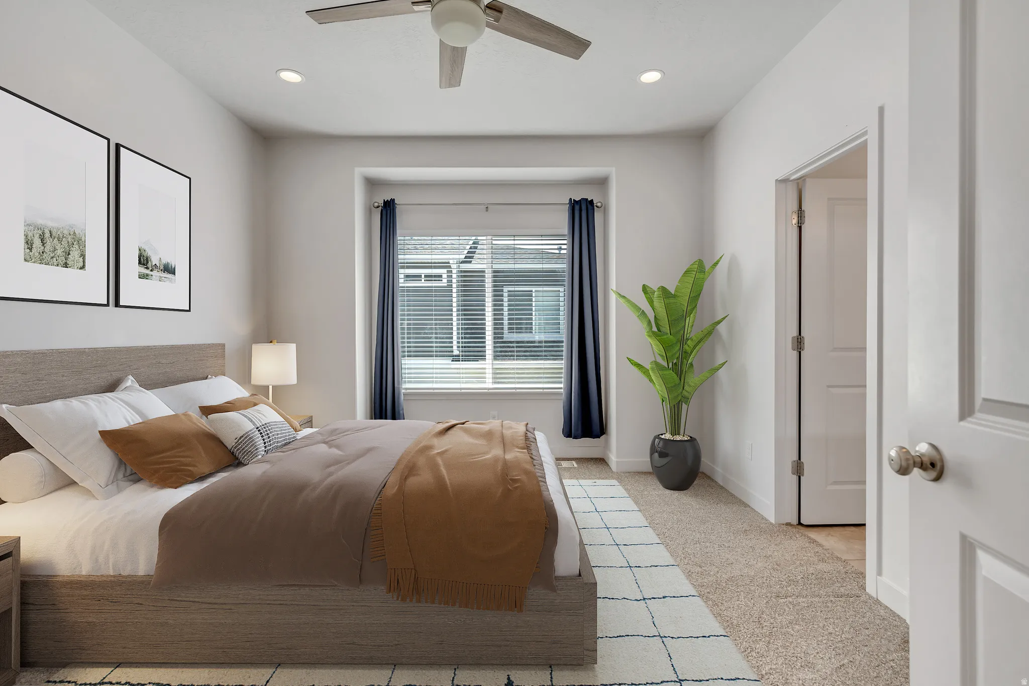 Carpeted bedroom featuring a ceiling fan, recessed lighting, and a window with horizontal blinds and drapery
