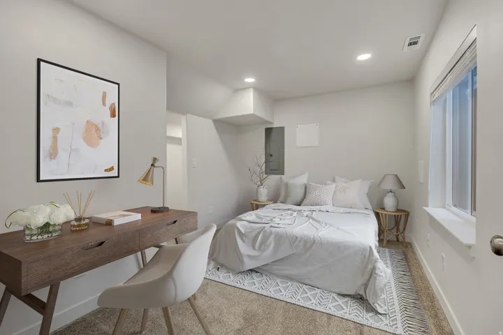 Carpeted room with recessed lighting, a single window, and light-toned wall finishes