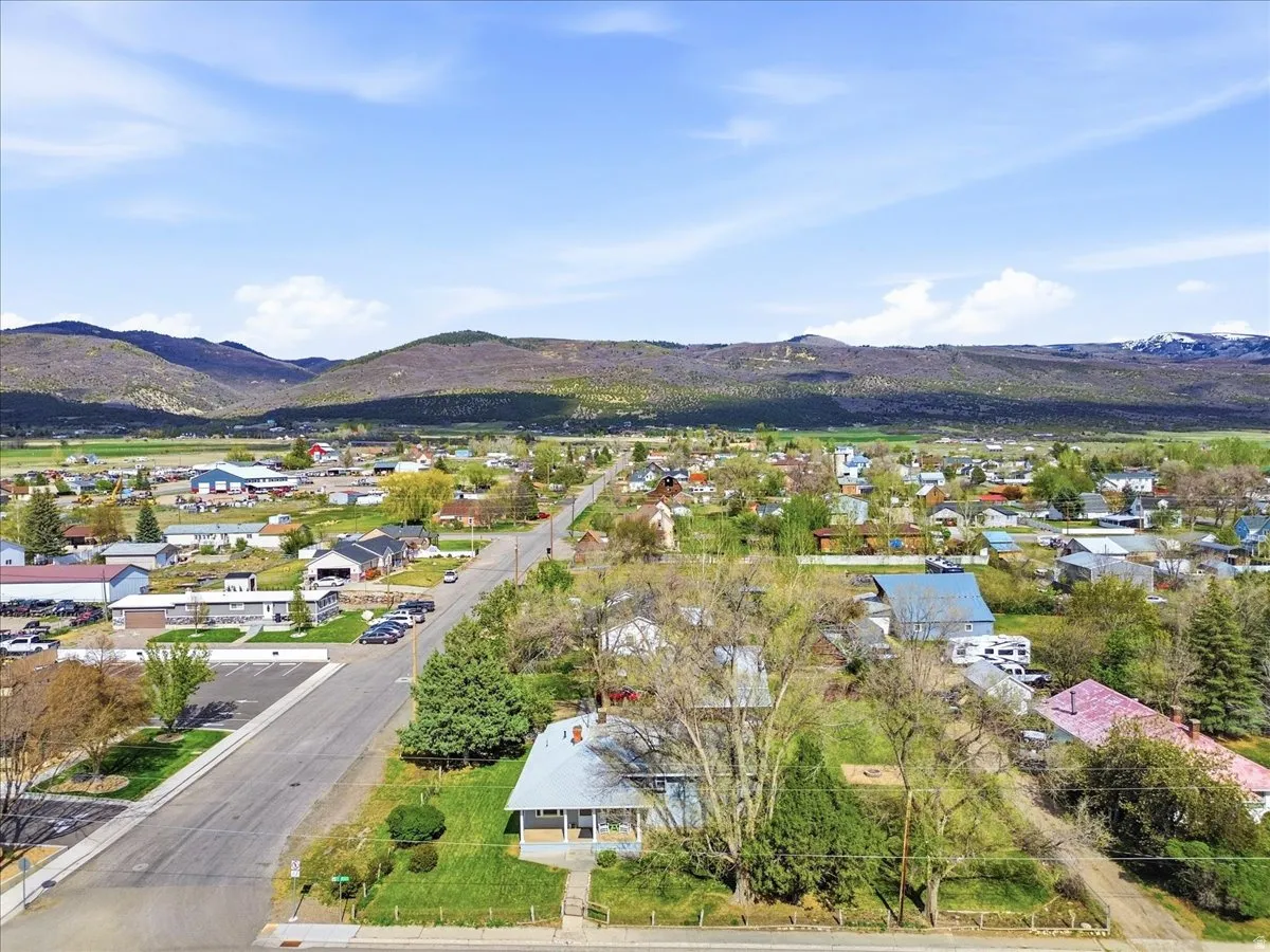 Expansive community landscape featuring residential properties and surrounding natural terrain