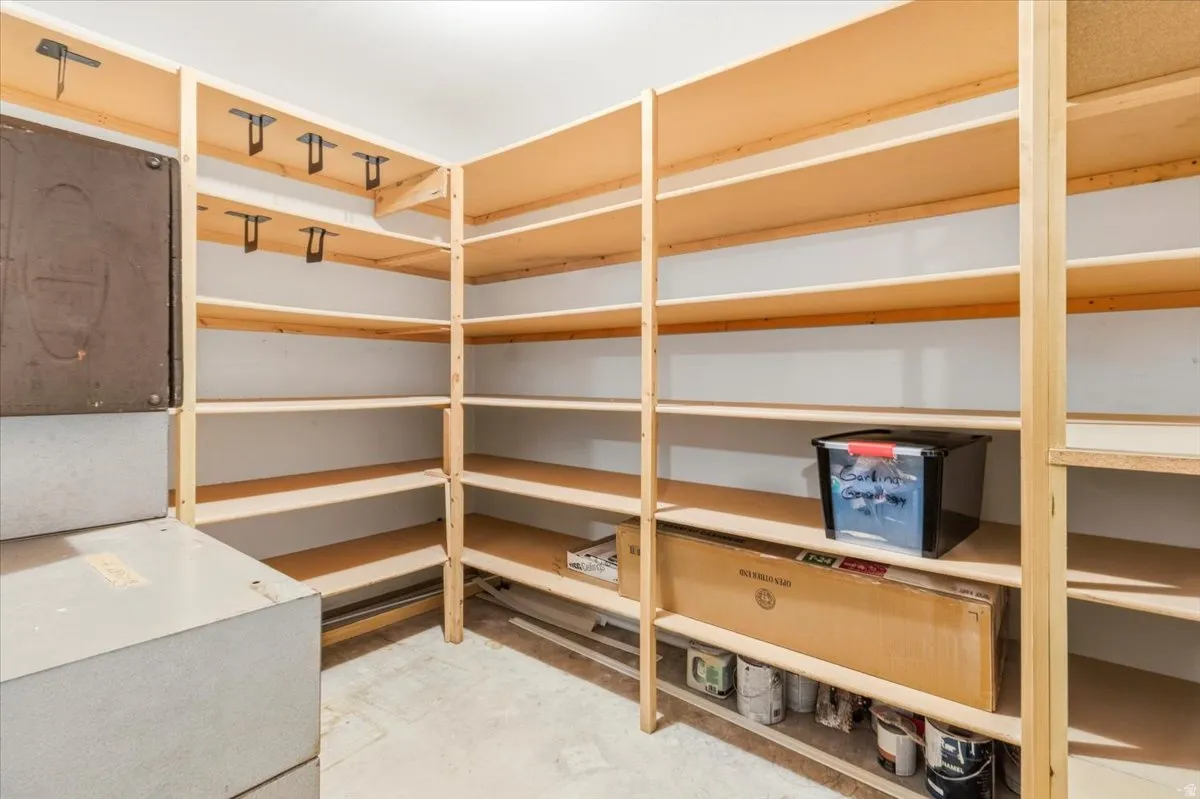 Built-in wood shelving providing extensive storage capacity