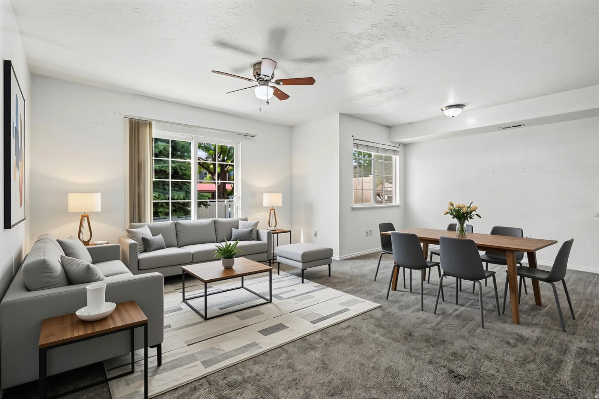 VIRTUALLY STAGED Living room and dining area.