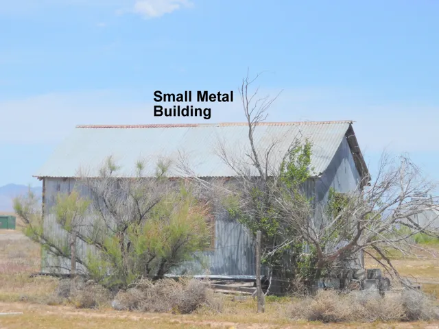 Another storage building included.