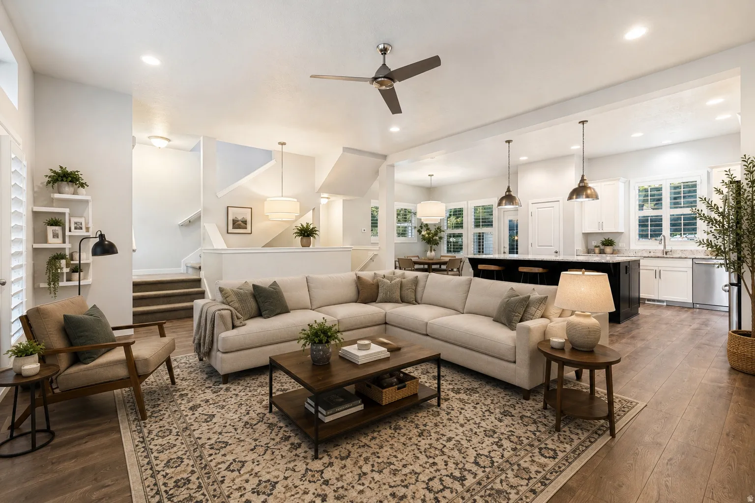 Digitally staged living, kitchen and dining
