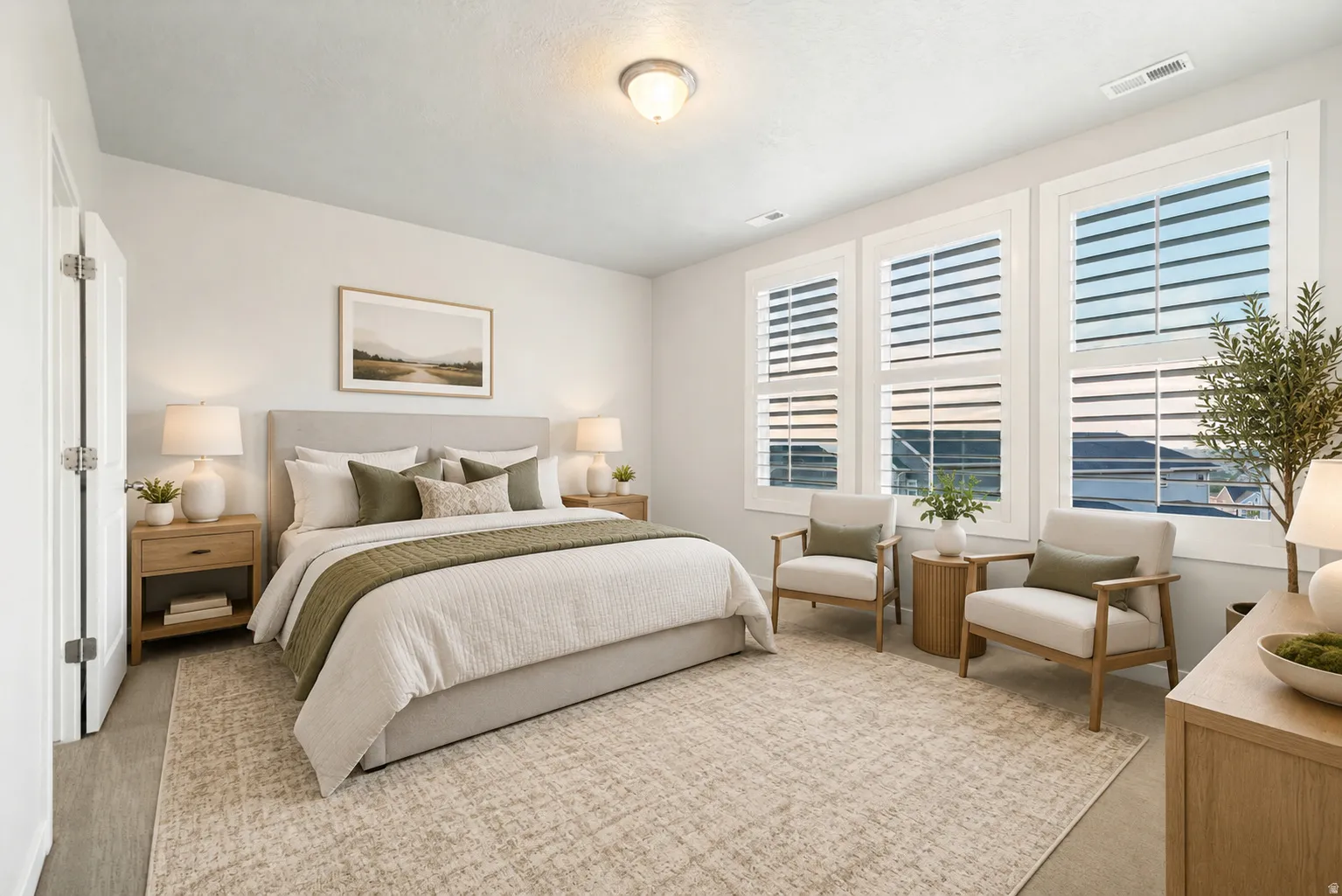 Digitally staged primary bedroom