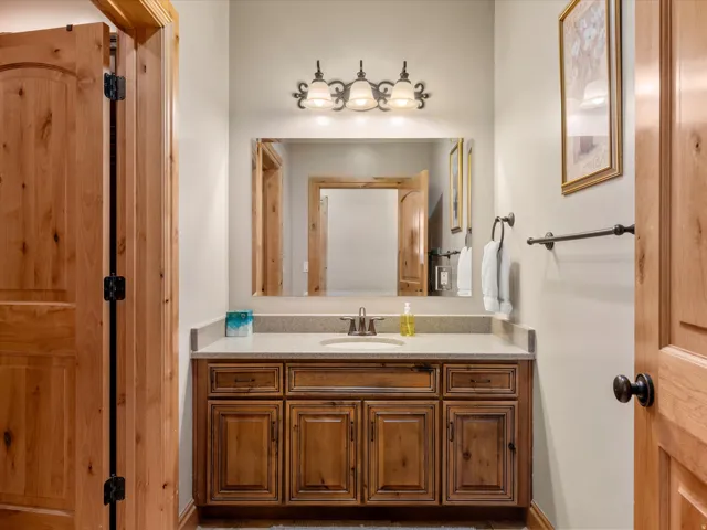 Warm wood-finish cabinetry with an integrated sink and light-toned countertop