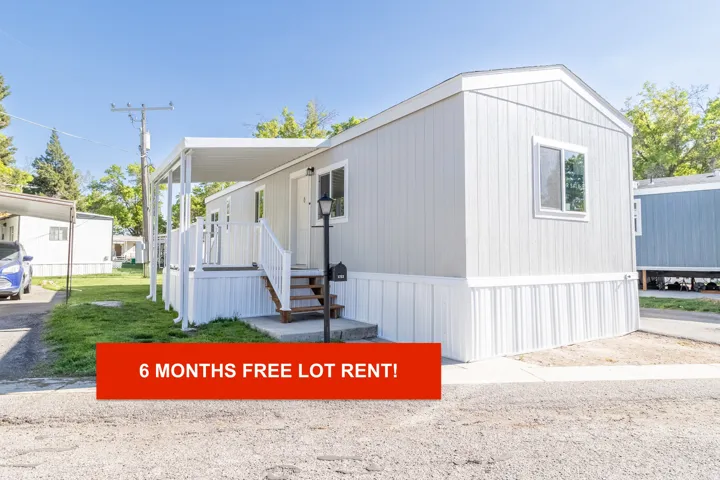 Light gray siding exterior with white trim