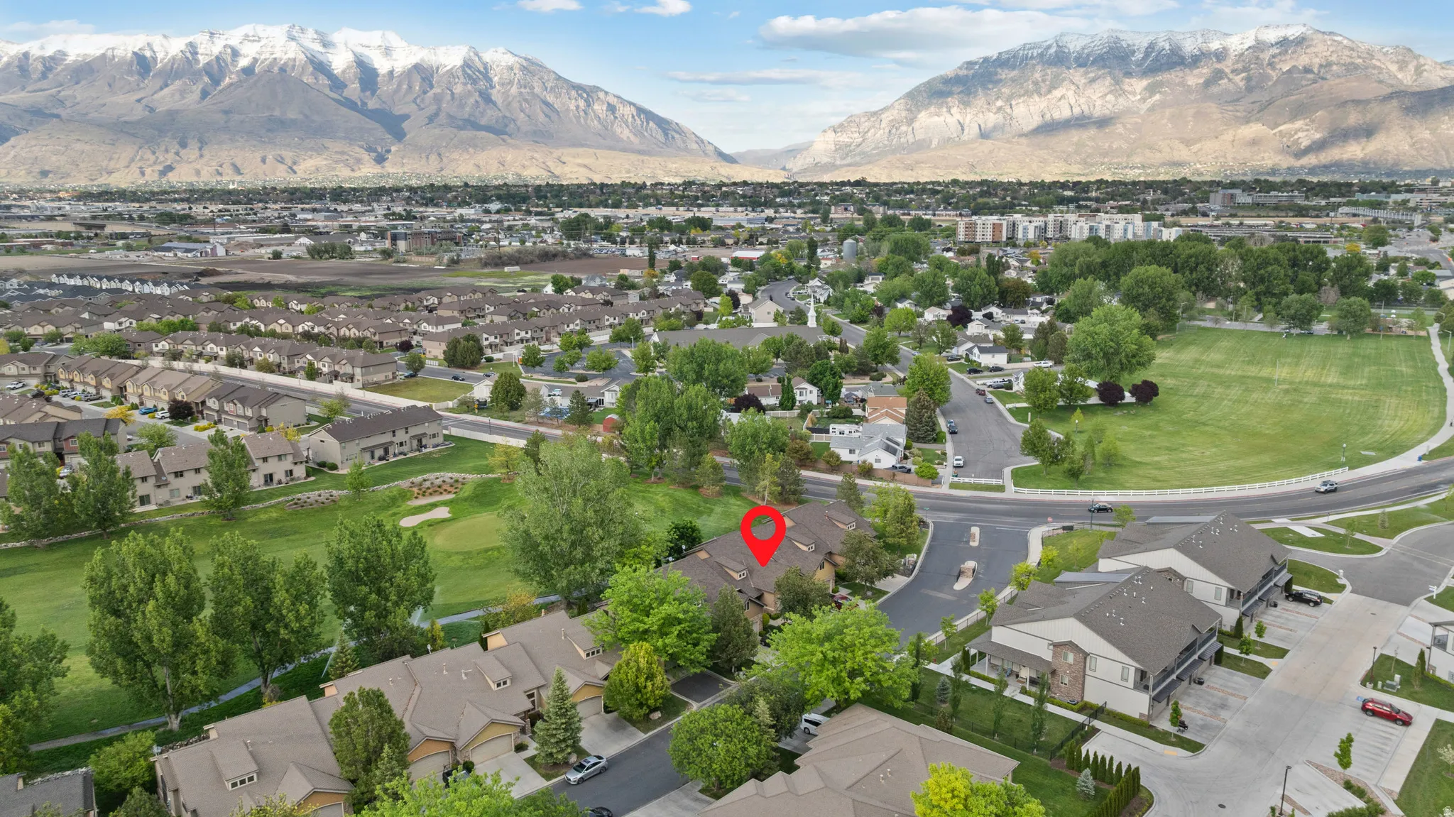 Townhome property with direct golf course frontage and mountain backdrop