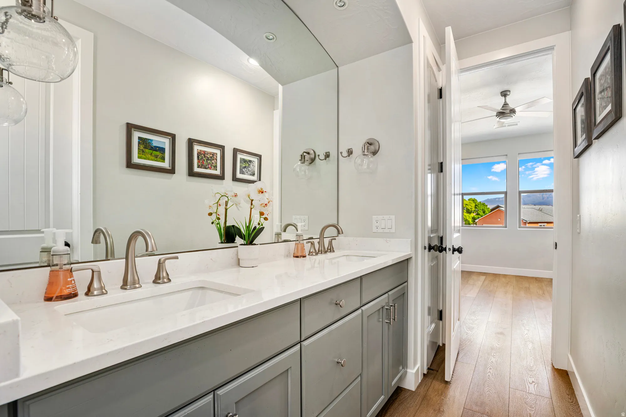Dual vanity featuring undermount sinks and brushed nickel fixtures