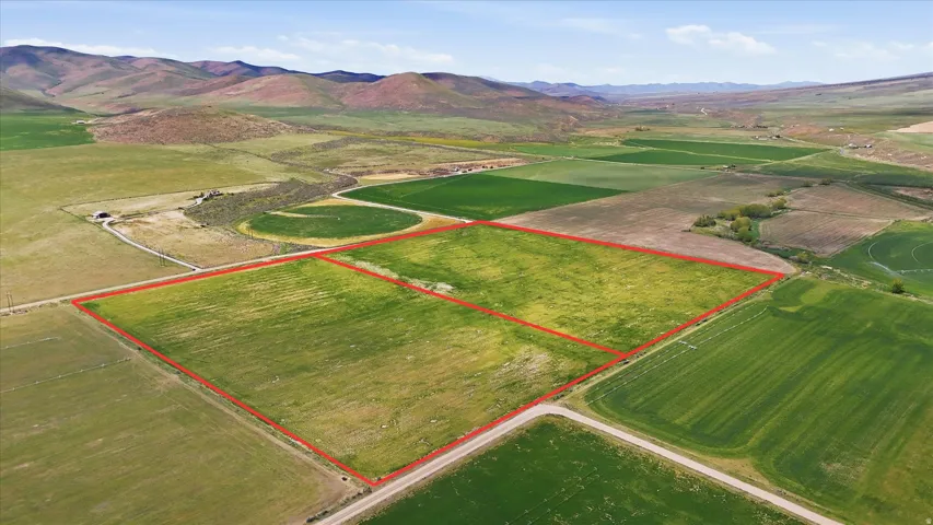 Expansive agricultural land featuring two delineated parcels of cultivated fields