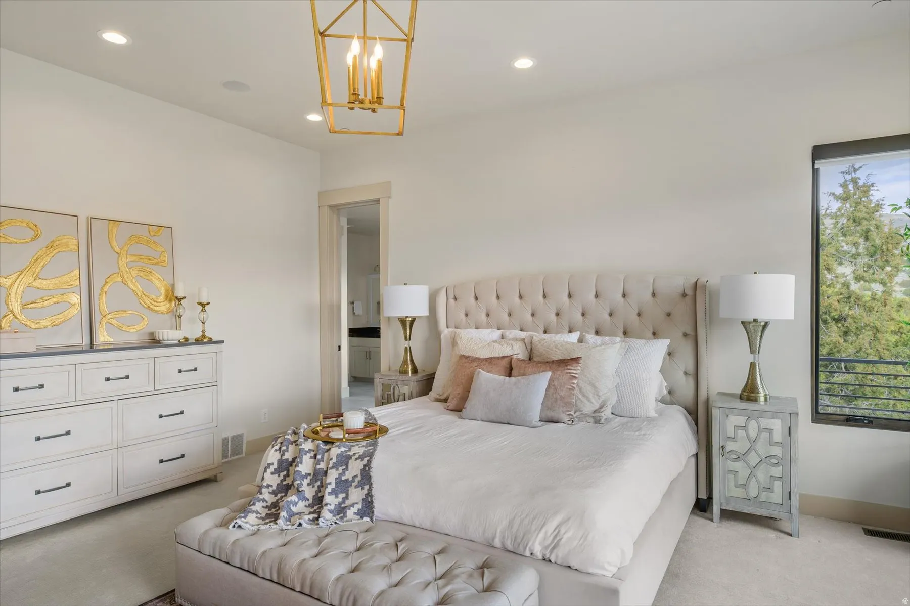 Master bedroom featuring sliding glass doors leading to back deck.