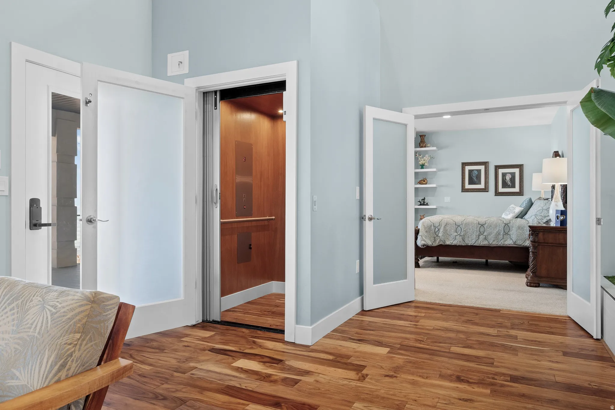 Hardwood flooring complementing light blue walls