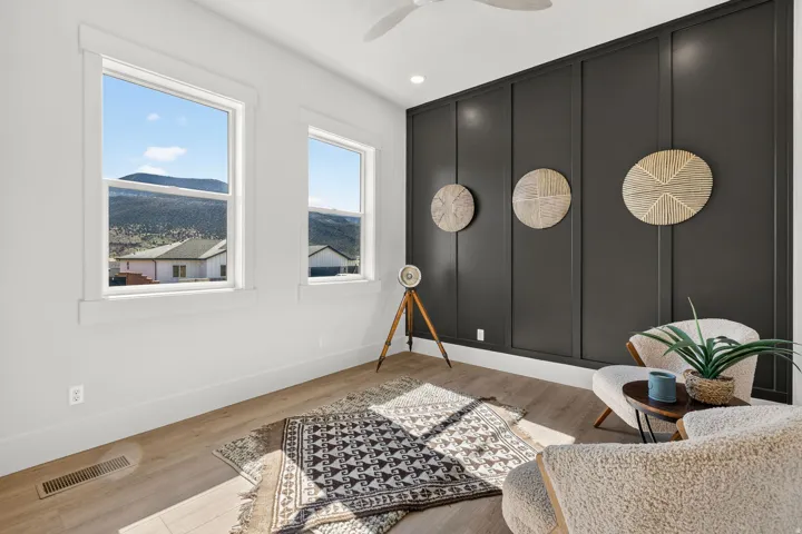 Accent wall featuring vertical paneling