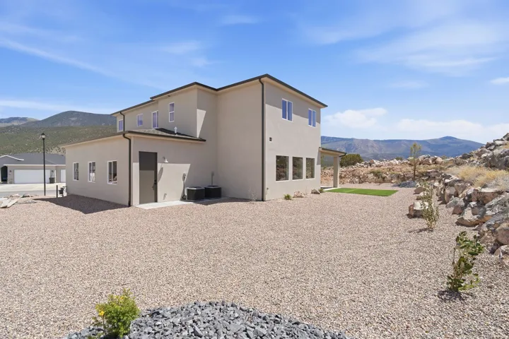 Stucco exterior with multiple windows