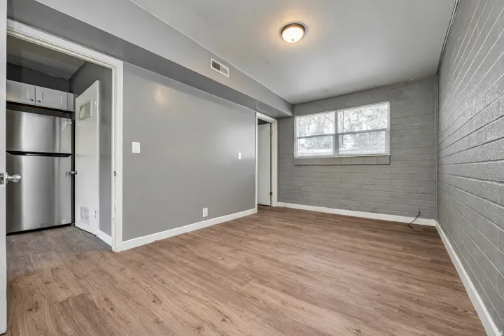 Unfurnished room with light wood finished floors