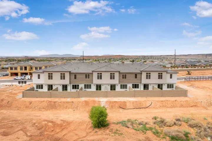 Newly constructed townhome community featuring contemporary architecture and a cohesive design aesthetic