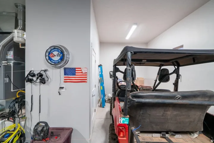 Workout area with heating unit and concrete flooring