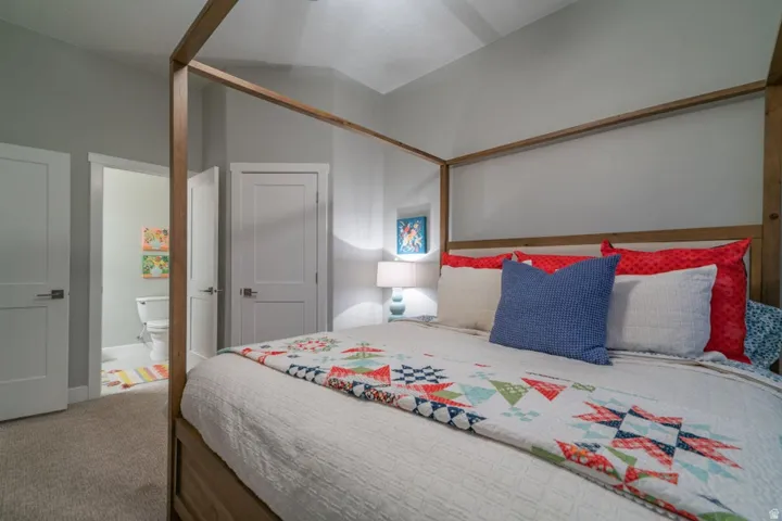 View of carpeted bedroom